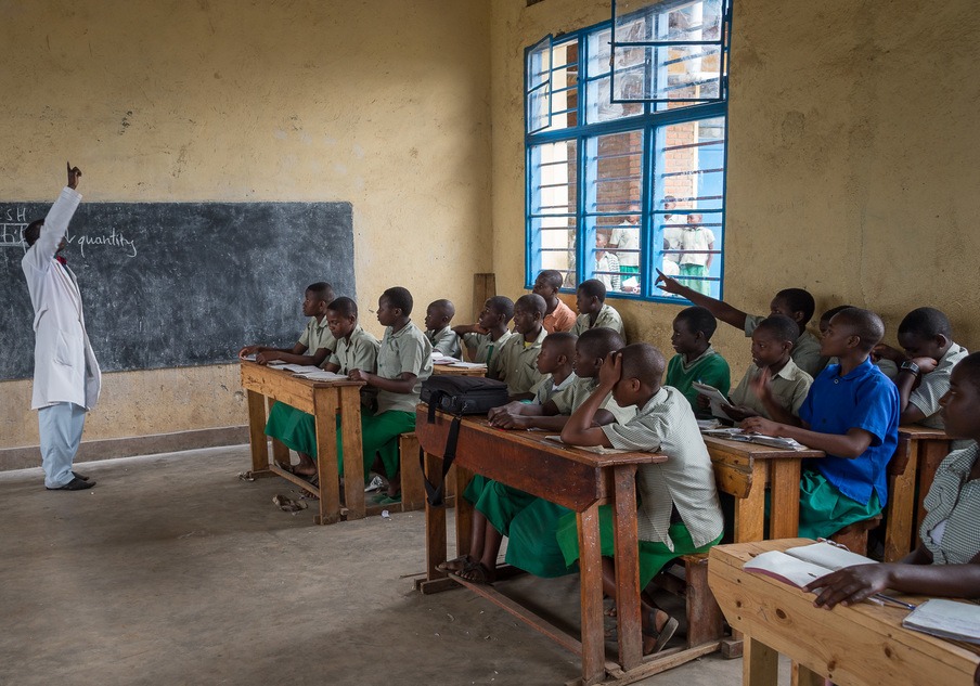 Pupils attending classes in one of the classrooms, part of SACOLA Community Rwanda.