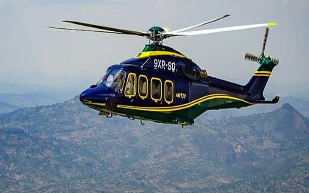 Tourists in an helicopter, part of your volcanoes experience by helicopter